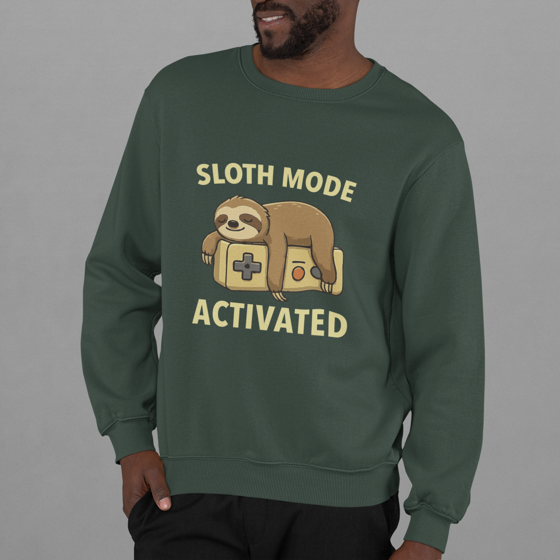 Adult sweatshirt in green with 'Sloth Mode Activated' with illustrated sloth & text. Funny graphic tees and hoodies.